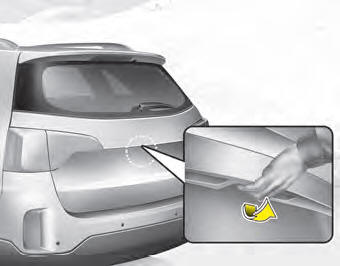 Press the tailgate handle switch carrying the smart key with you.