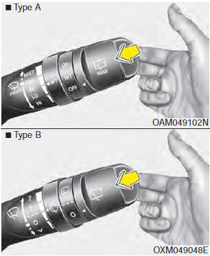 In the OFF position, pull the lever gently toward you to spray washer fluid on