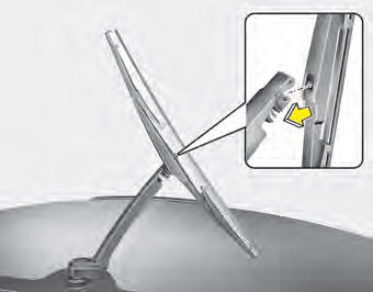 2. Install the new blade assembly by inserting the center part into the slot